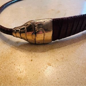 Leather Belt with silver closer in size 34” this belt is not adjustable!